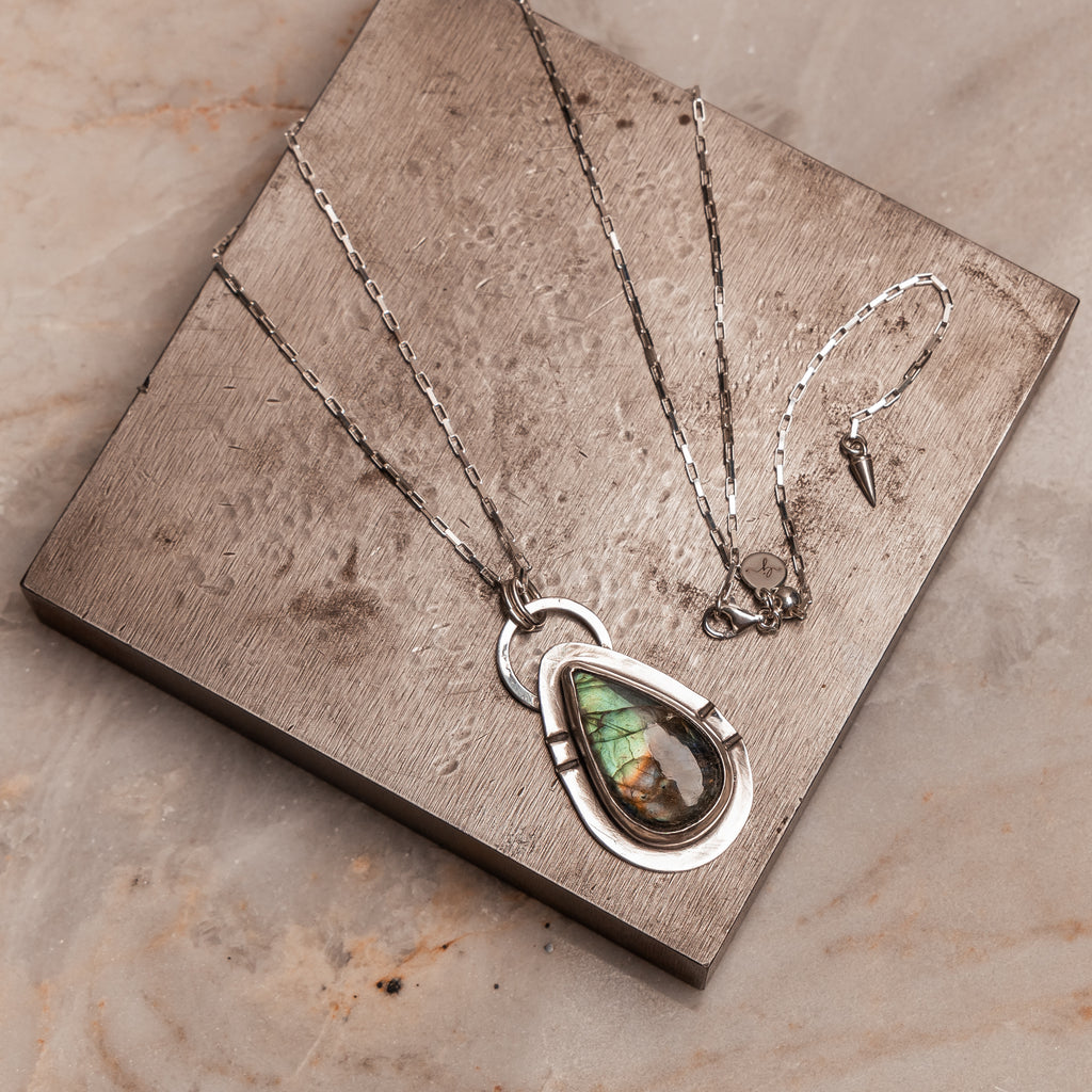 "Artisan-crafted labradorite pendant - where mystical gemstone meets bohemian luxury jewelry"