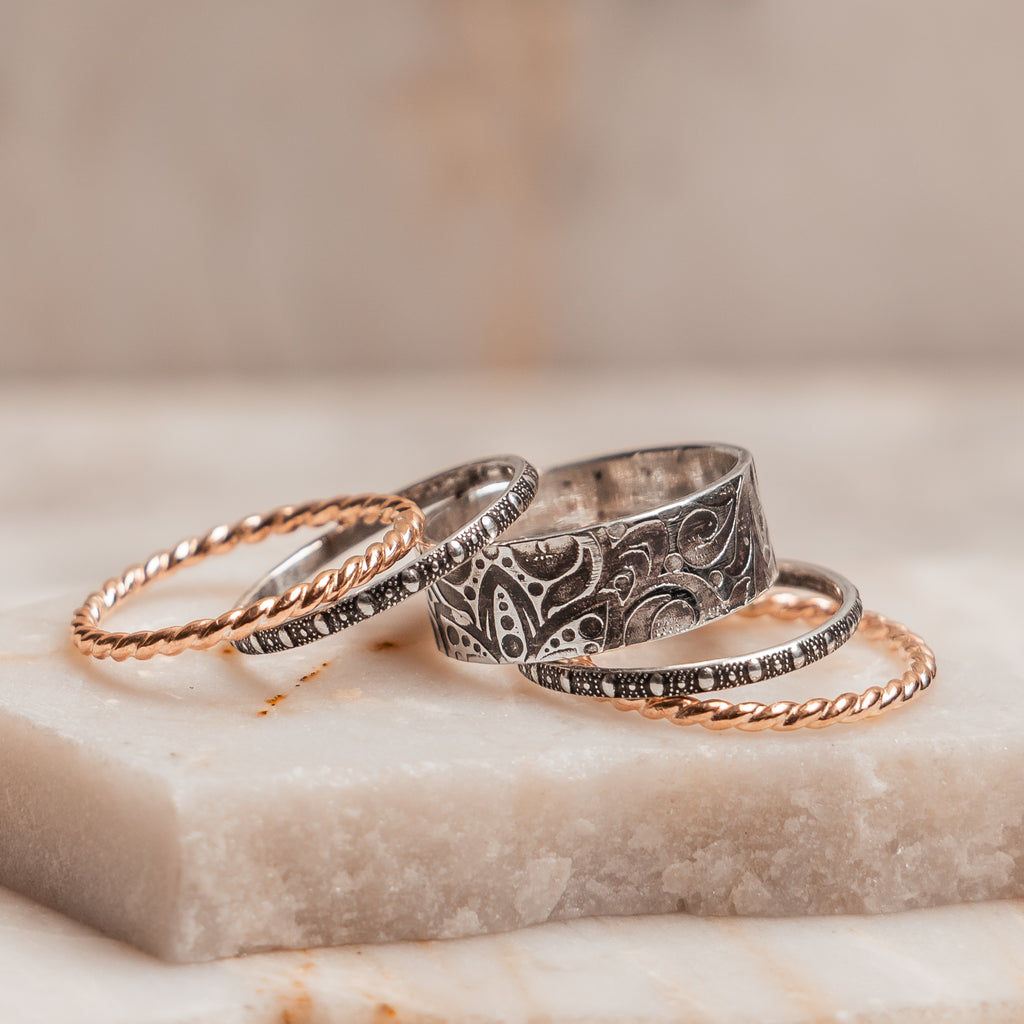 "Vintage-inspired mixed metal stacking rings - artisan-crafted sterling silver and gold filled bands for the modern romantic"