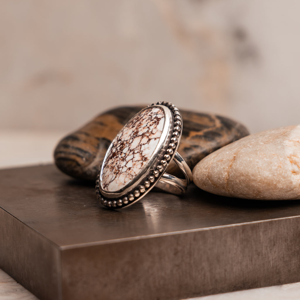 Southwestern-inspired size 6 ring with large oval wild horse magnesite centerpiece