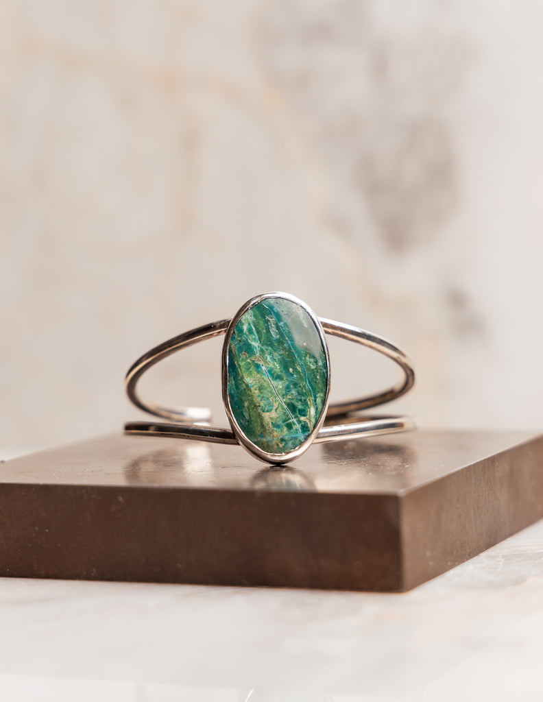 "Statement Christabel Cuff Bracelet featuring a one-of-a-kind blue Peruvian opal gemstone."

