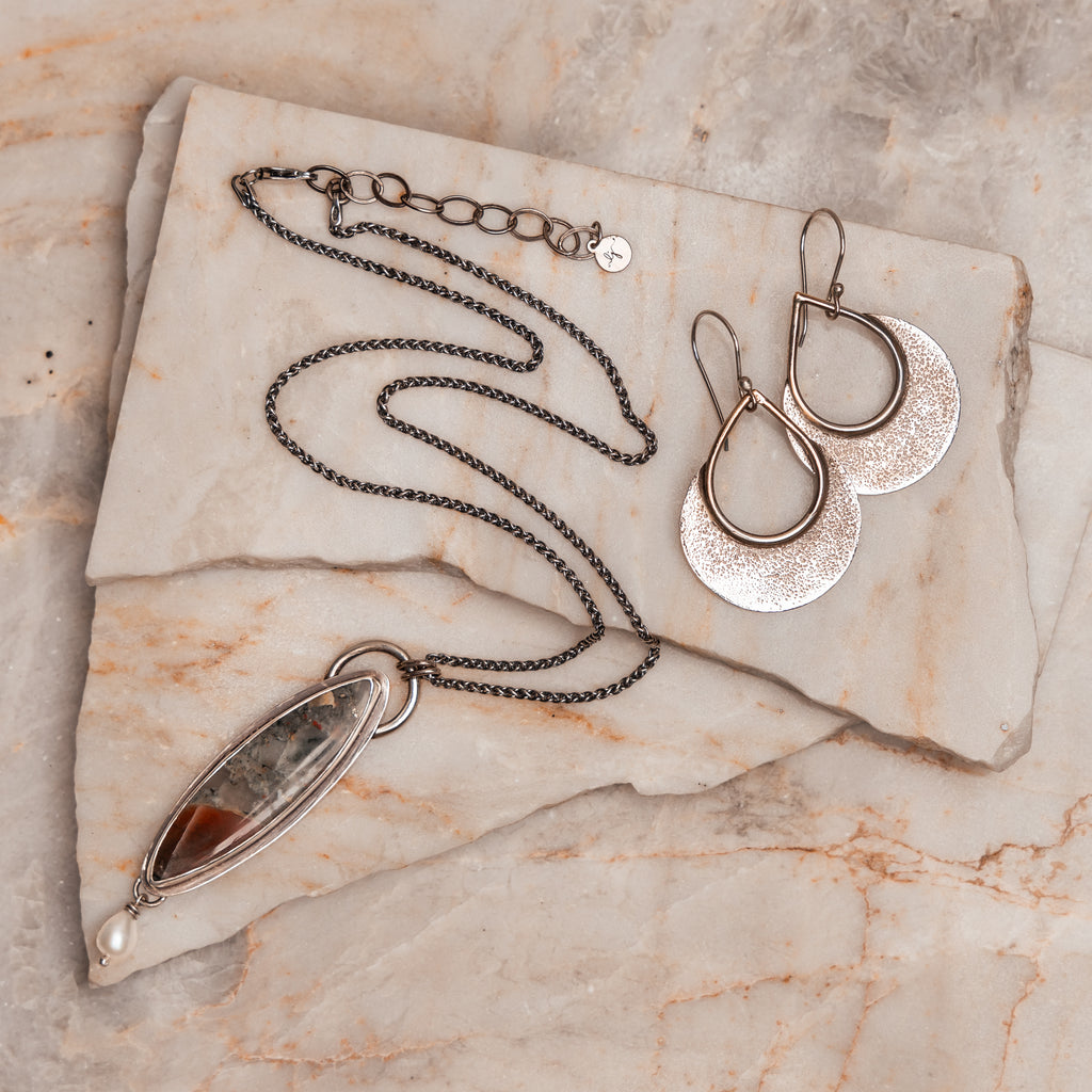 Artisanal jewelry: Silver necklace with natural stone centerpiece and delicate pearl charm and silver rustic hoop earrings