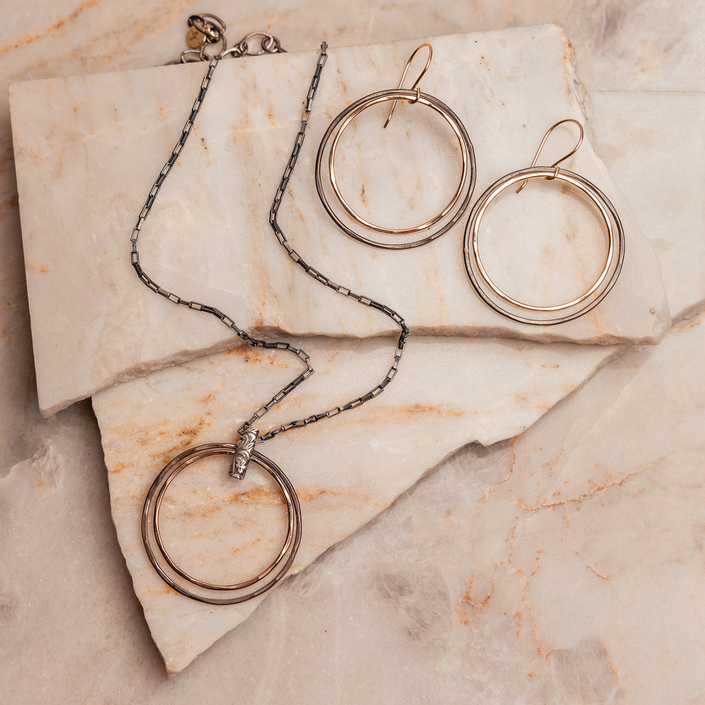 "Elegant Helena Necklace and earrings showcasing the sophisticated blend of gold-filled and oxidized sterling silver elements."

