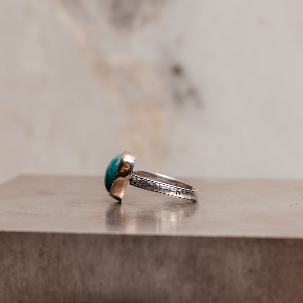 "Natural blue-green chrysocolla ring with mixed metal setting - handcrafted collection"

