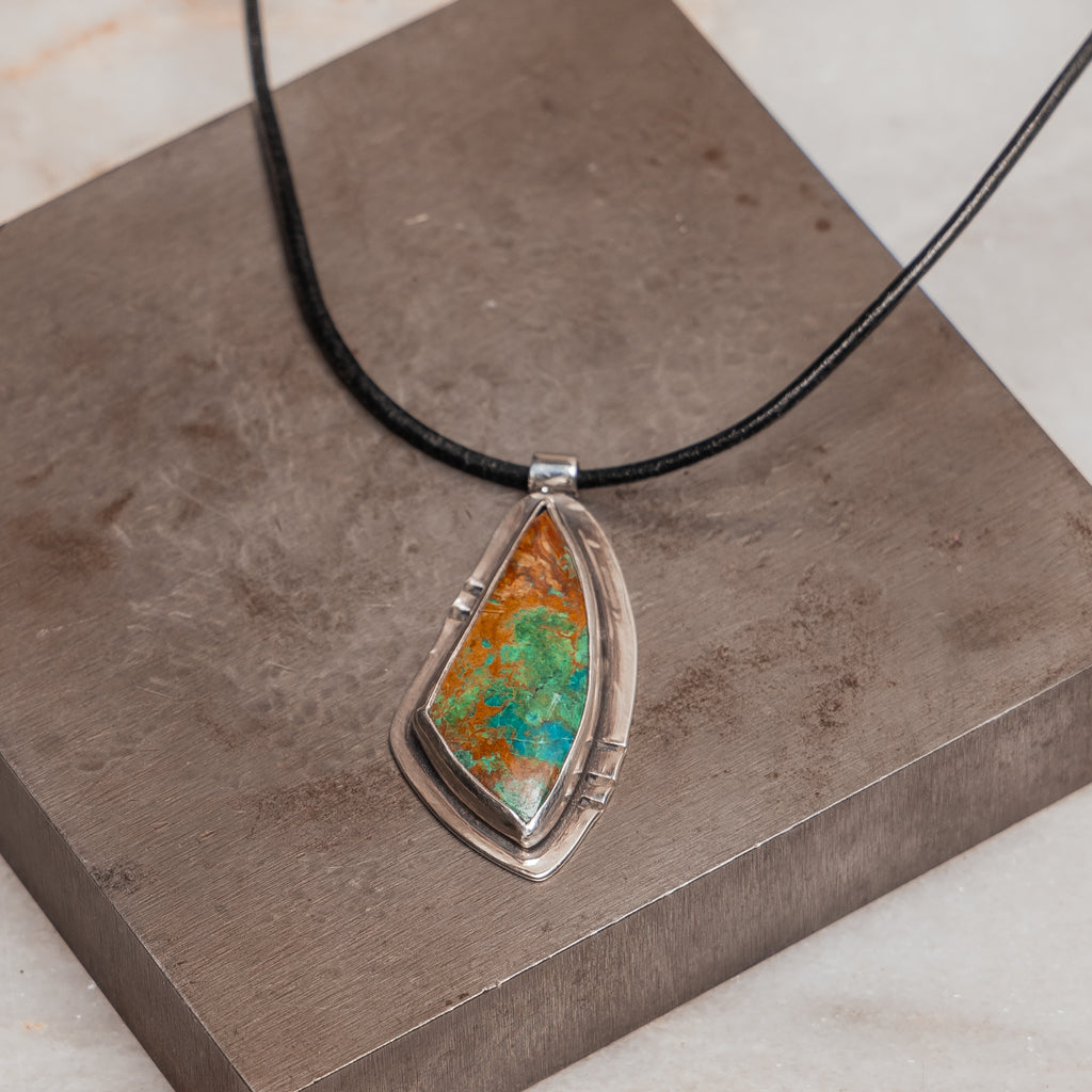 "Artisan sterling silver pendant featuring natural chrysocolla stone with turquoise and copper patterns - Kylie Necklace"

