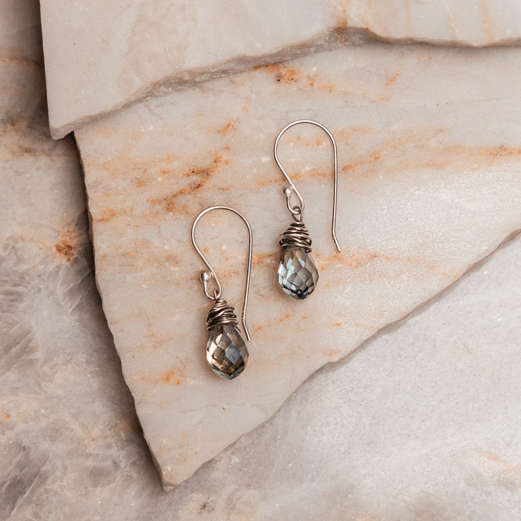 "Artisan-made crystal earrings: Lila collection showcasing delicate wire wrapping and faceted stones"