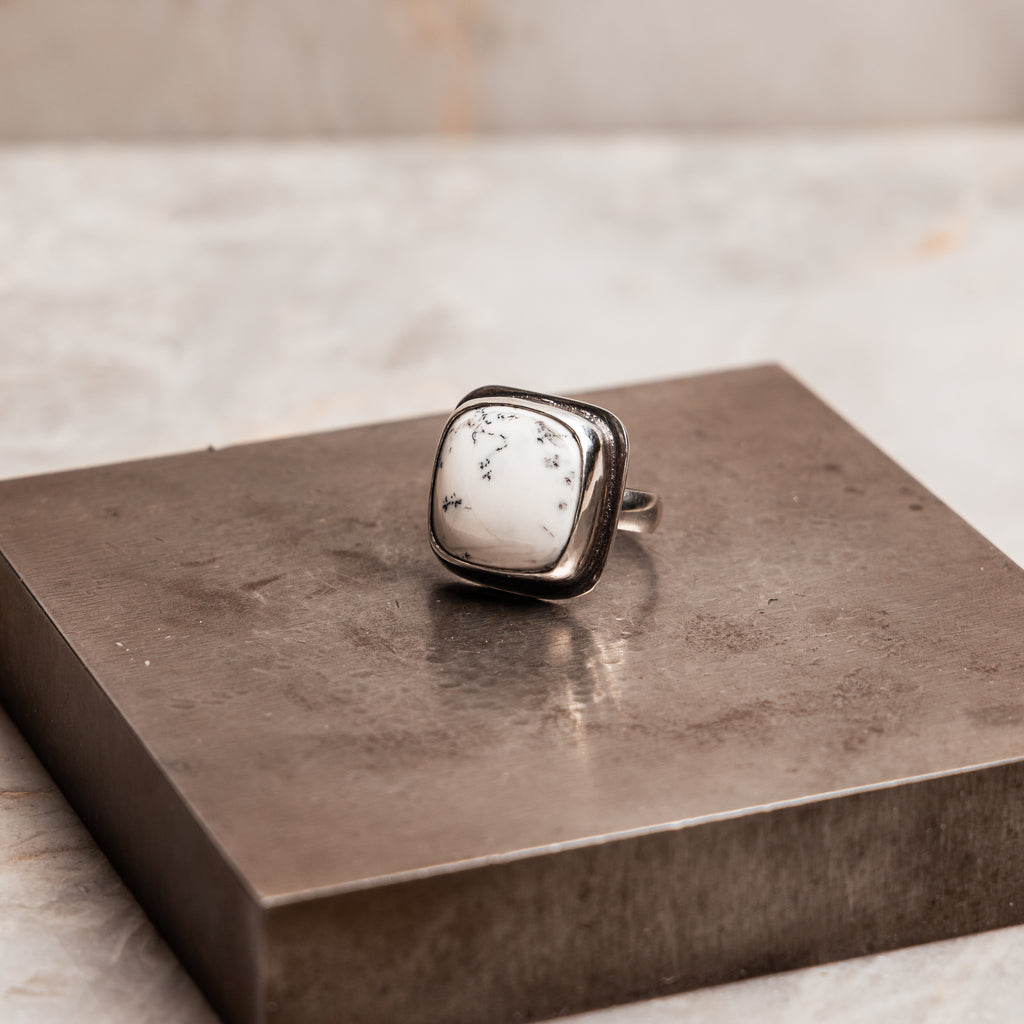 "Melina Ring featuring a unique dendritic opal with natural fern-like patterns in sterling silver."

