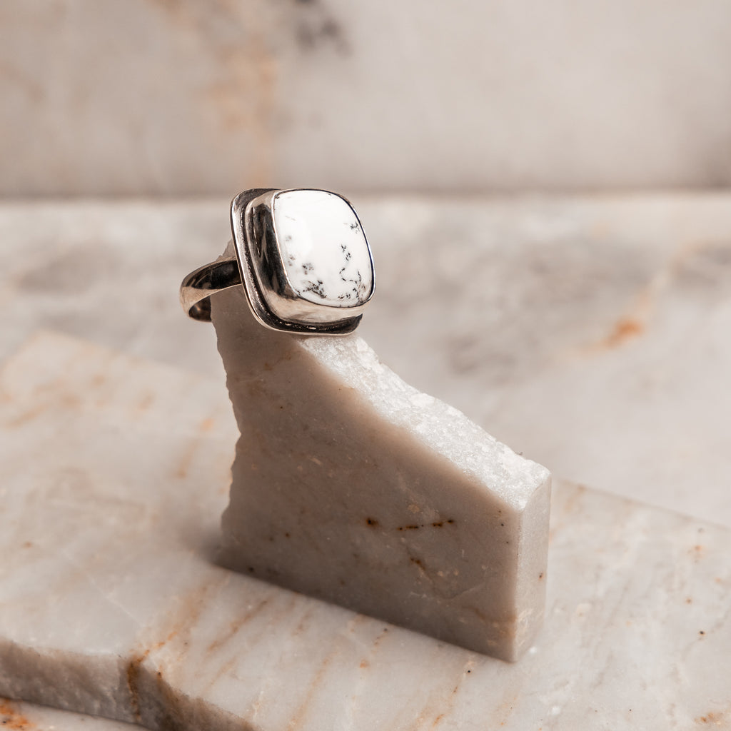 "Hand-forged Sterling Silver Melina Ring showcasing unique dendritic opal with nature-inspired patterns."

