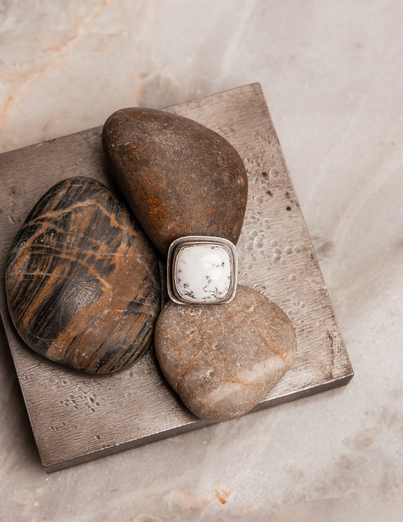 "Hand-forged Melina Statement Ring with square dendritic opal setting."

