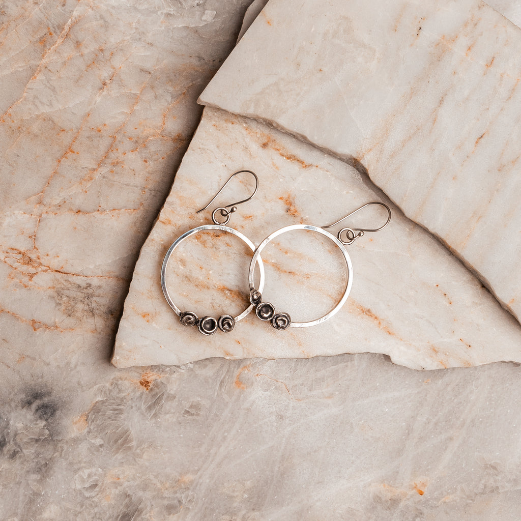 Modern Parker Silver Hoop Earrings showcasing organic design