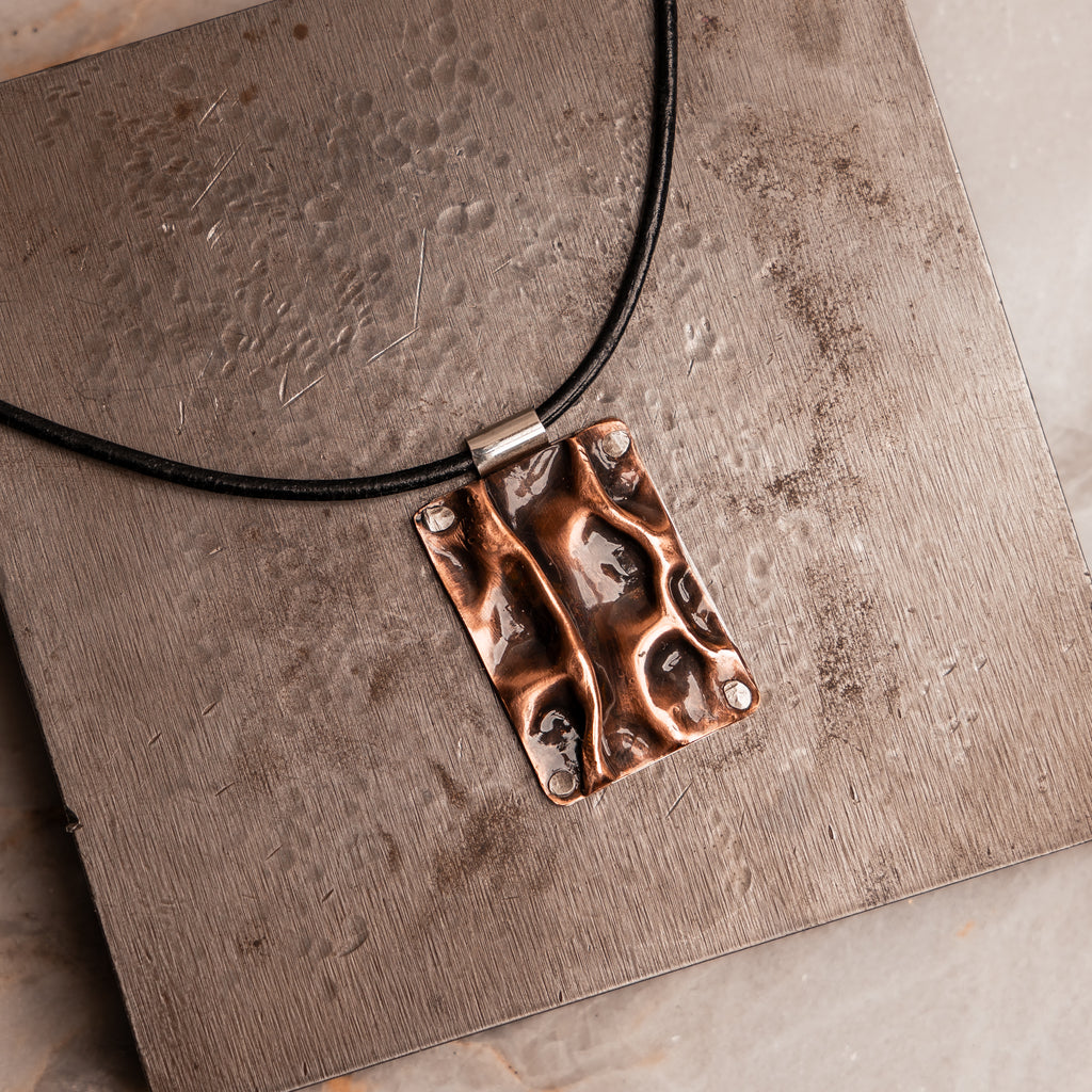 Rustic mixed metal pendant with Greek leather cord and adjustable length