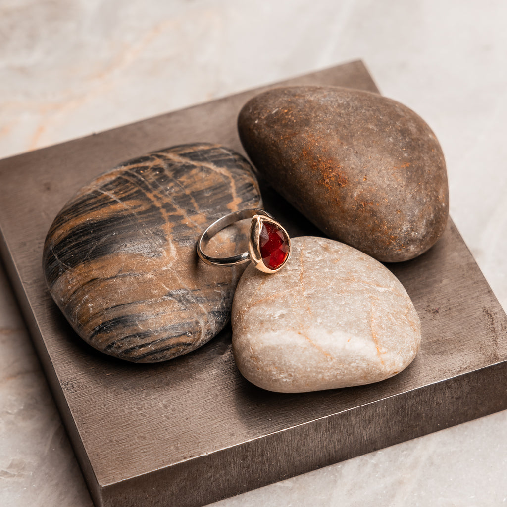 "Teardrop garnet ring with 14k gold bezel and sterling silver band - mixed metal statement jewelry"