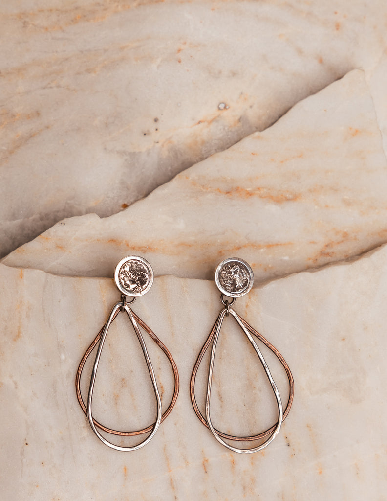 Boho-chic Roxanna Earrings showcasing artistic metalwork with sterling silver and copper elements