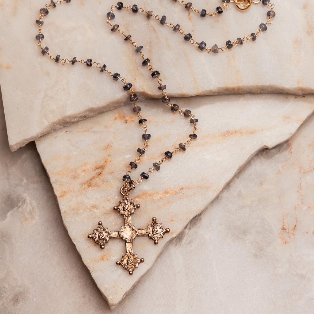 "Close-up of the vintage-inspired Ruth Necklace showcasing its intricate Gothic cross and elegant beaded design."
