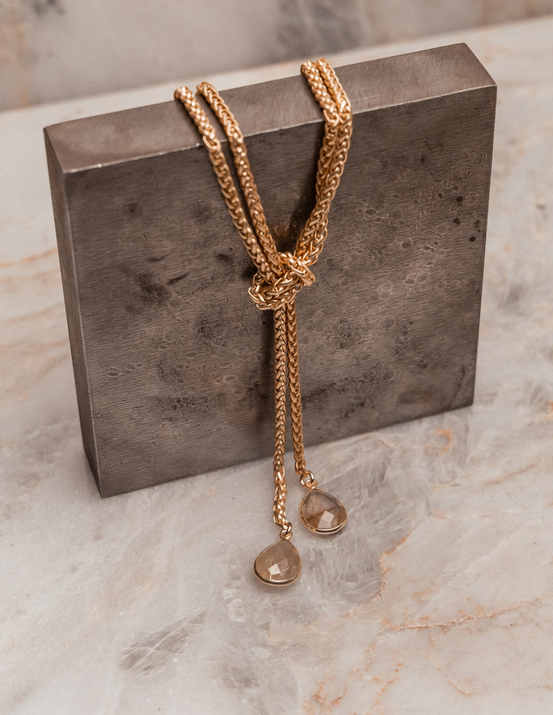 Luxury adjustable necklace featuring teardrop gemstones in gold - Genevieve collection